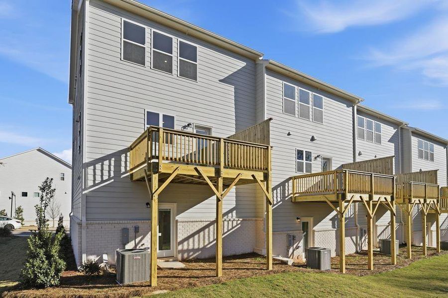 Exterior details and patio area of a home in Somerset at Veterans Memorial, Mableton (Image 22).