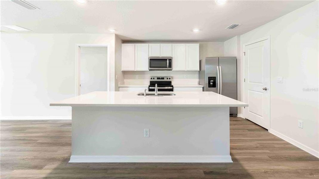 Furnished interior view inside a new home in Bella Lago, Parrish (Image 15). Furnished interior view inside a new home in Bella Lago, Parrish (Image 15).