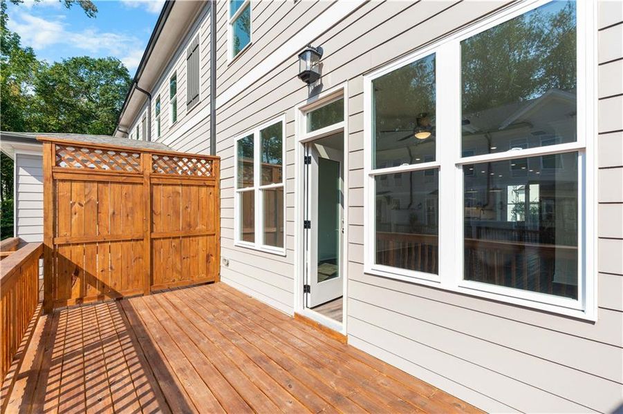 Exterior details and patio area of a home in Evanshire Townhomes, Duluth (Image 26). Exterior details and patio area of a home in Evanshire Townhomes, Duluth (Image 26).