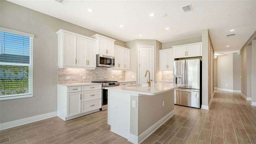 Furnished interior view inside a new home in Wildleaf at North River Ranch, Parrish (Image 7).