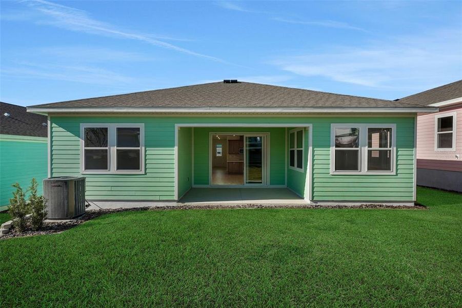 Exterior details and patio area of a home in Green Key Village, Lady Lake (Image 23).