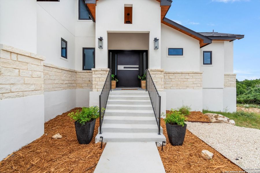 Front exterior of a new home in , New Braunfels, TX, highlighting curb appeal (Image 2). Front exterior of a new home in , New Braunfels, TX, highlighting curb appeal (Image 2).