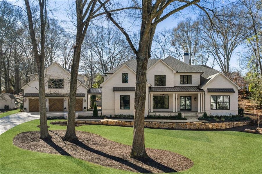 Front exterior of a new home in , Alpharetta, GA, highlighting curb appeal (Image 27).