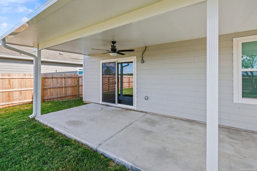 Exterior details and patio area of a home in Hennersby Hollow, San Antonio (Image 3).