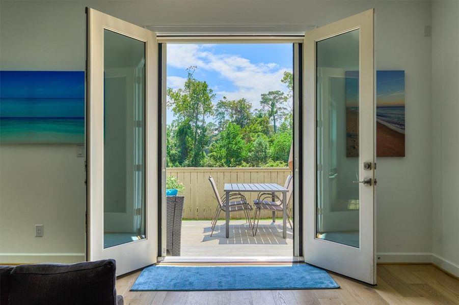 Step outside through the French doors to the back patio and tranquil views from the great room!