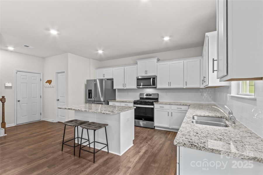 Furnished interior view inside a new home in Calvin Creek, Troutman (Image 5).