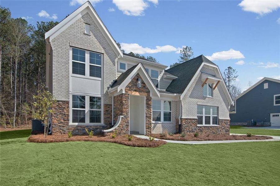 Front exterior of a new home in Governor’s Preserve, Canton, GA, highlighting curb appeal (Image 26). Front exterior of a new home in Governor’s Preserve, Canton, GA, highlighting curb appeal (Image 26).