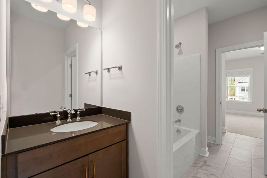 Furnished interior view inside a new home in Tidewater at Lakes of Cane Bay, Summerville (Image 37).