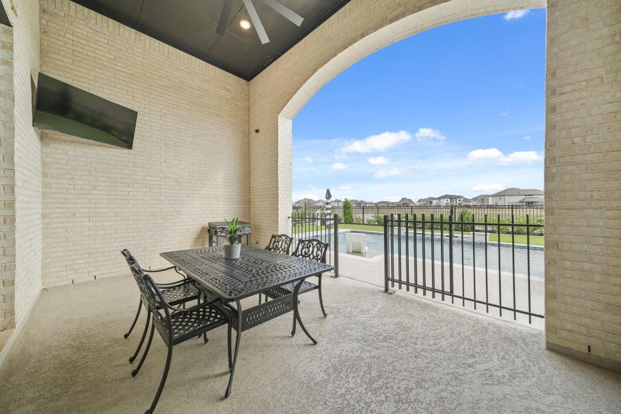 The 19’ x 13’ back covered patio features recessed lights, a ceiling fan, television mount, a gas stub for a barbecue grill and a wrought-iron gate leading to the pool. The patio also has easy access to the kitchen making entertaining convenient and easy.