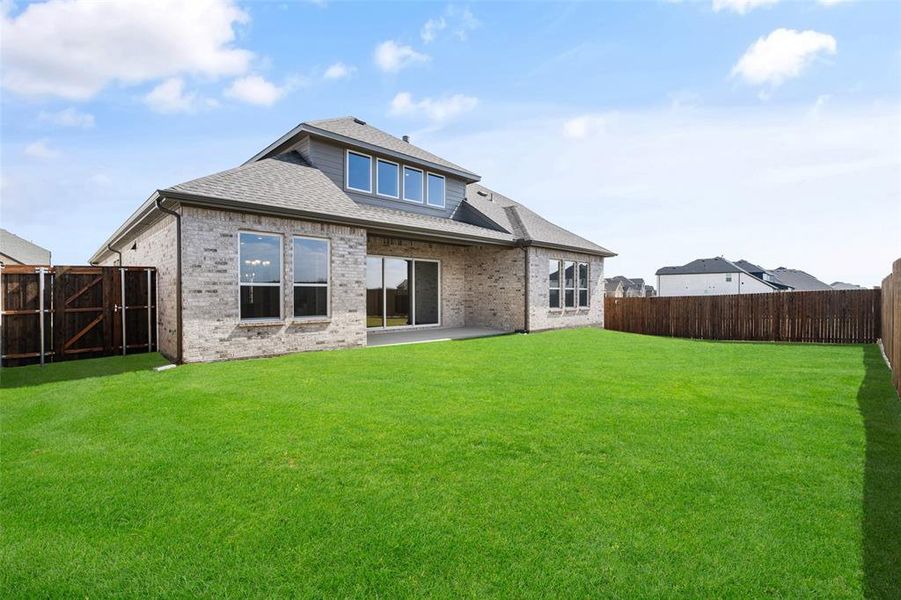 Exterior details and patio area of a home in Lake Breeze, Lavon (Image 19).