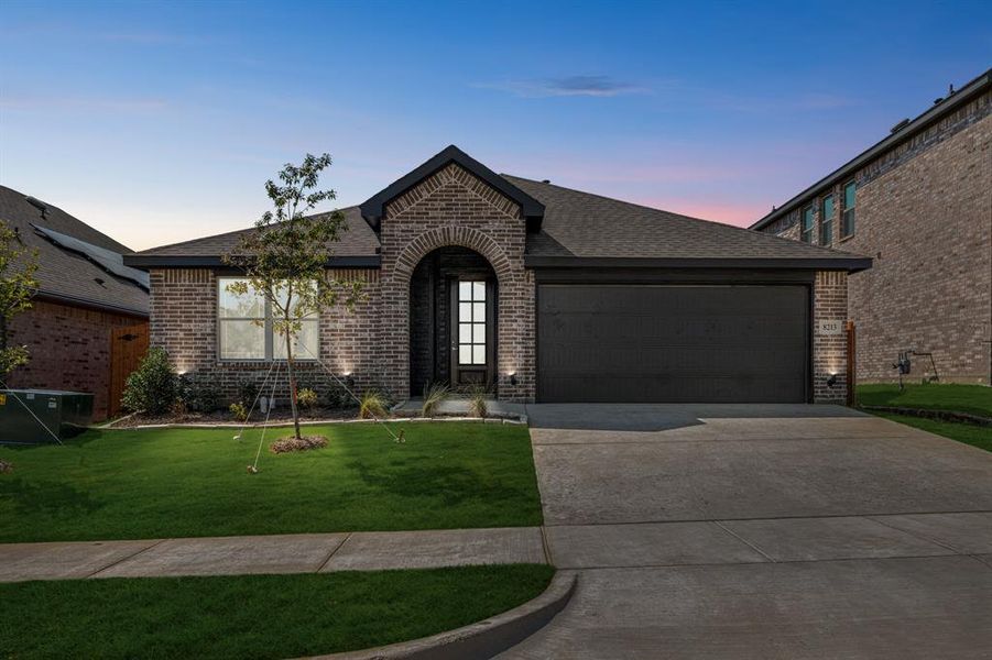 Front exterior of a new home in Godley Ranch Elements, Godley, TX, highlighting curb appeal (Image 24).