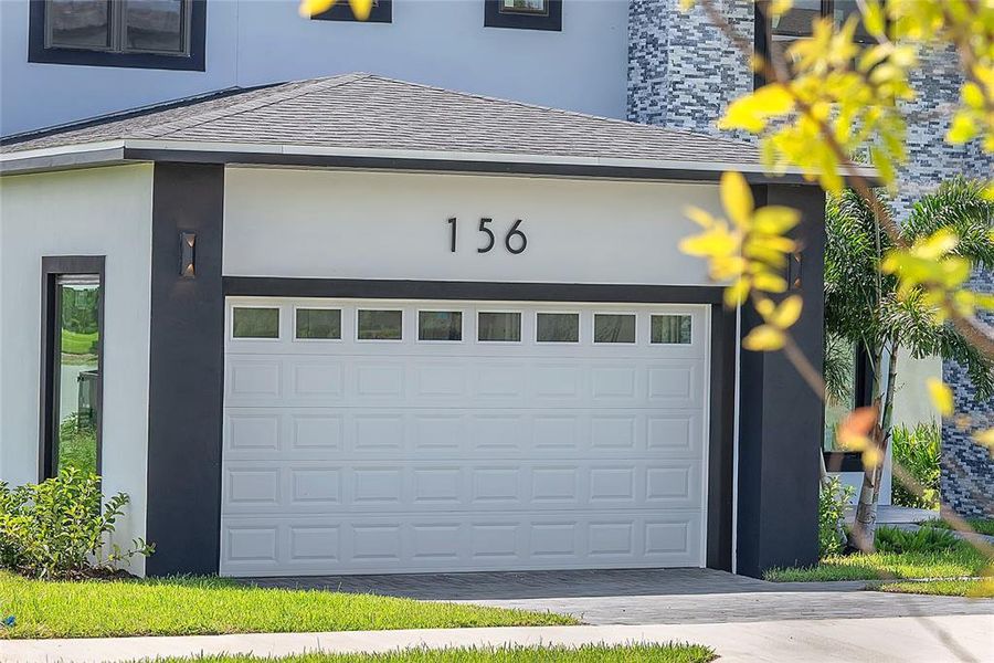 Front exterior of a new home in , Lake Alfred, FL, highlighting curb appeal (Image 29).