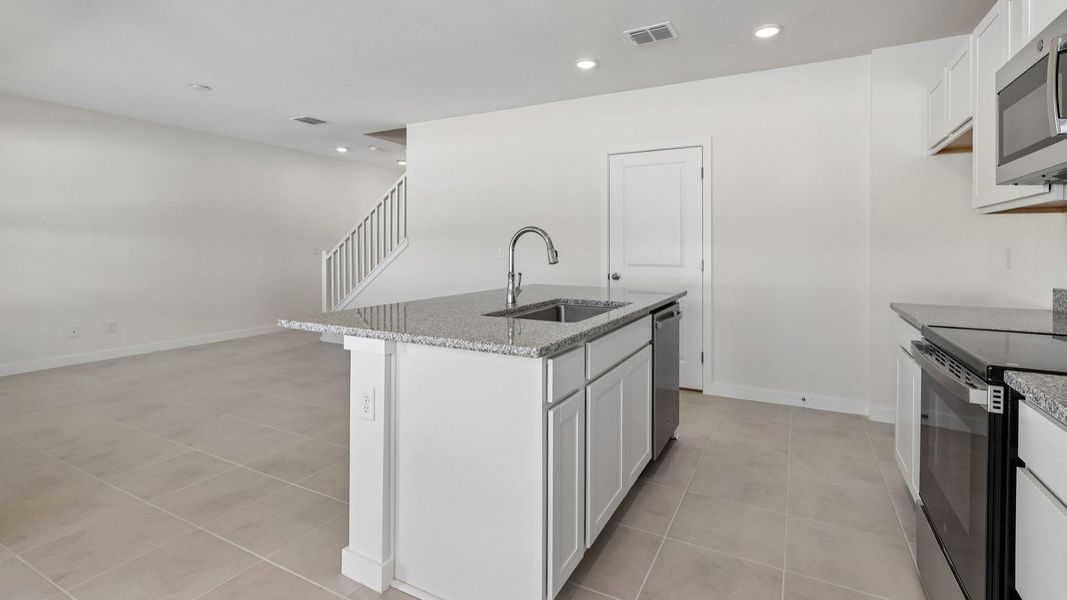Furnished interior view inside a new home in Cyrene at Harmony, St. Cloud (Image 11). Furnished interior view inside a new home in Cyrene at Harmony, St. Cloud (Image 11).