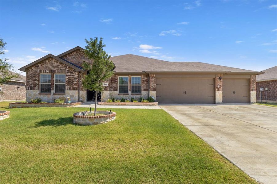 Front exterior of a new home in Waverly Estates, Josephine, TX, highlighting curb appeal (Image 16).