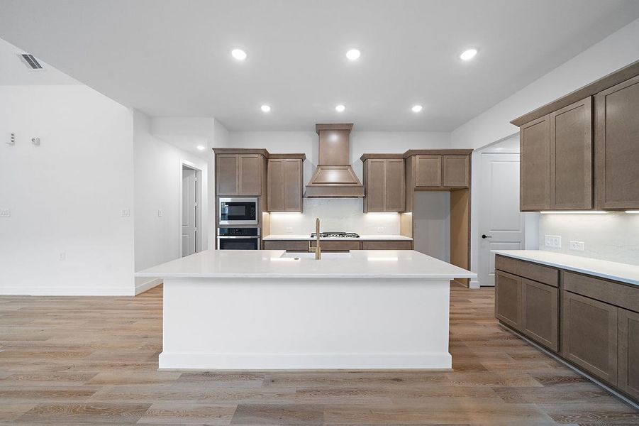 Representative furnished interior of a home built from the Cardinal by Caldwell Homes in Chambers Creek, Willis (Image 10).