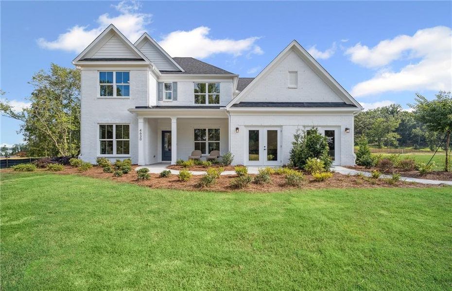 Front exterior of a new home in Rose Creek, Cumming, GA, highlighting curb appeal (Image 1). Front exterior of a new home in Rose Creek, Cumming, GA, highlighting curb appeal (Image 1).