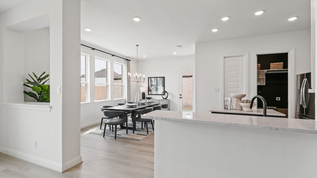 Representative furnished interior of a home built from the Mimosa by DRB Homes in Brookewater, Rosenberg (Image 12).