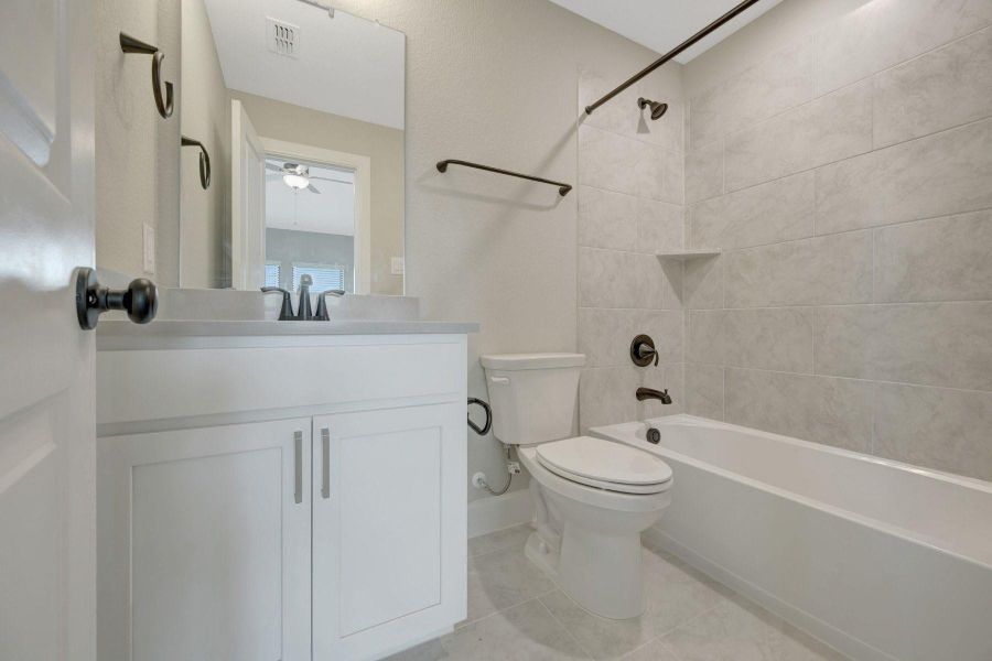 Furnished interior view inside a new home in Riceland - Enclave Row Collection, Mont Belvieu (Image 6).