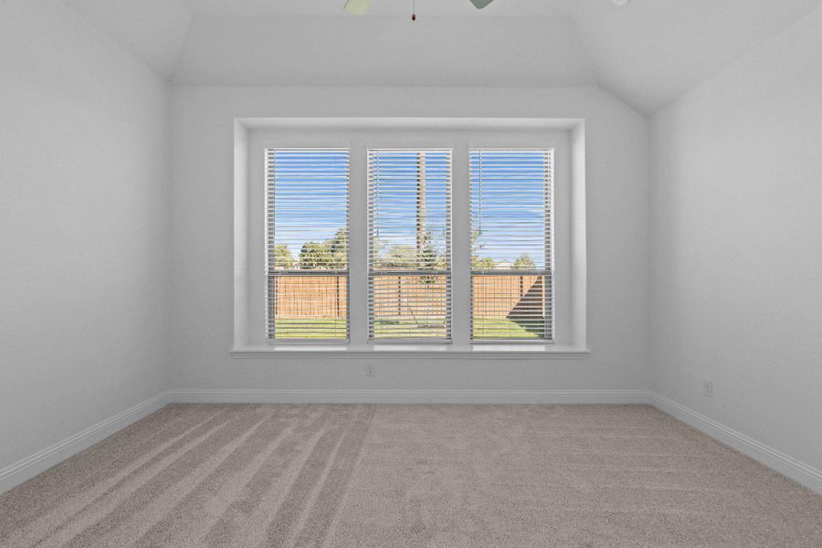 Primary Bedroom with elevated ceiling Primary Bedroom with elevated ceiling