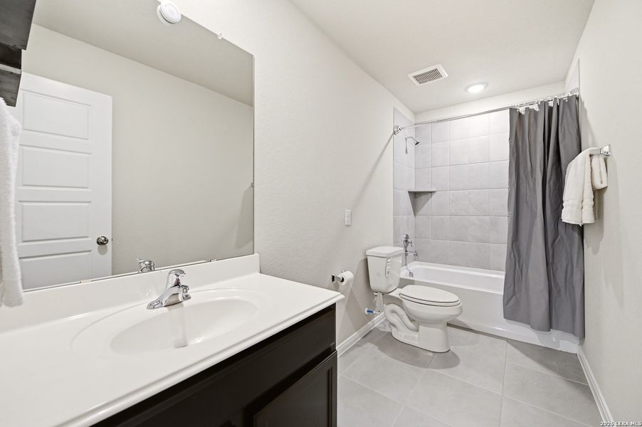 Furnished interior view inside a new home in Winding Brook, San Antonio (Image 38).