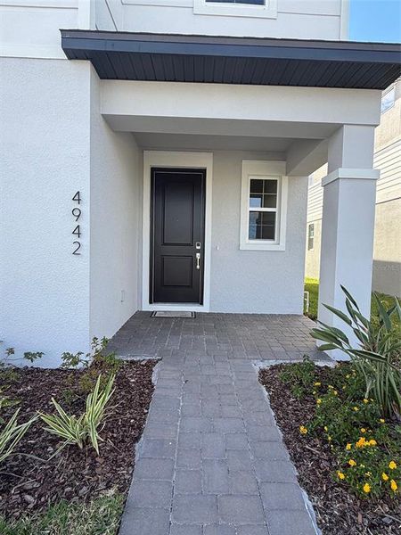 Exterior details and patio area of a home in Havenfield at Crossprairie, St. Cloud (Image 2). Exterior details and patio area of a home in Havenfield at Crossprairie, St. Cloud (Image 2).
