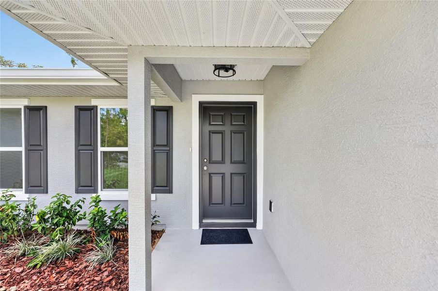 Exterior details and patio area of a home in , Ocala (Image 4).