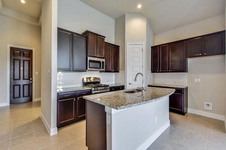 Representative furnished interior of a home built from the Oaks 1933 by Brohn Homes in Oaks at San Gabriel, Georgetown (Image 3).