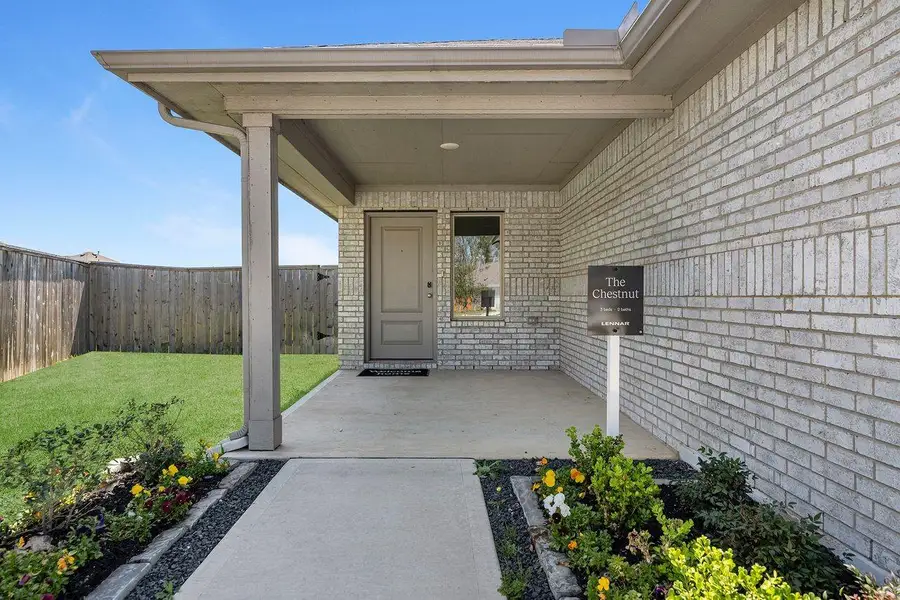 Exterior details and patio area of a home in Tavola, New Caney (Image 3).