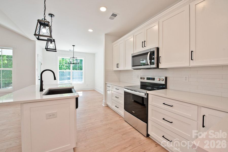Furnished interior view inside a new home in , Concord (Image 13).