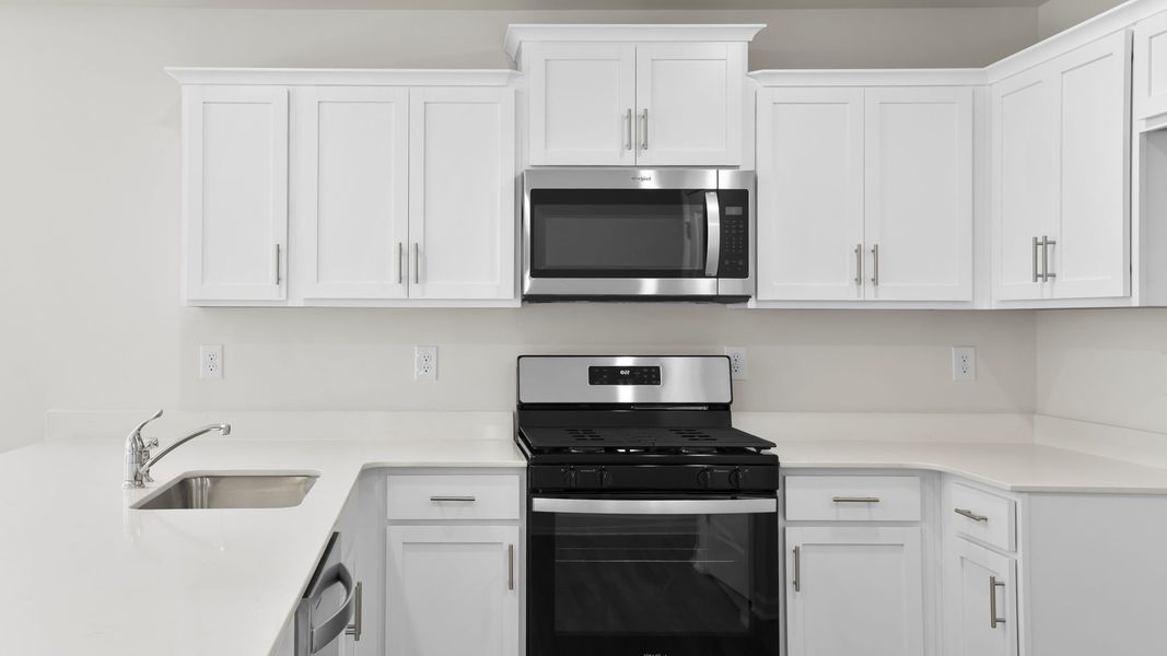 Furnished interior view inside a new home in Village Grove, Greenville (Image 9).