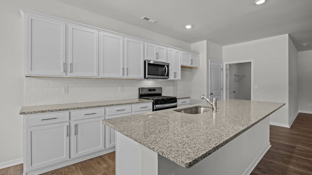 Furnished interior view inside a new home in East Ridge, Ayden (Image 4).