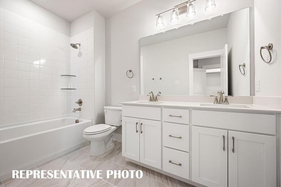 With dual sinks, guests will enjoy their own space in this relaxing guest bath. REPRESENTATIVE PHOTO With dual sinks, guests will enjoy their own space in this relaxing guest bath. REPRESENTATIVE PHOTO
