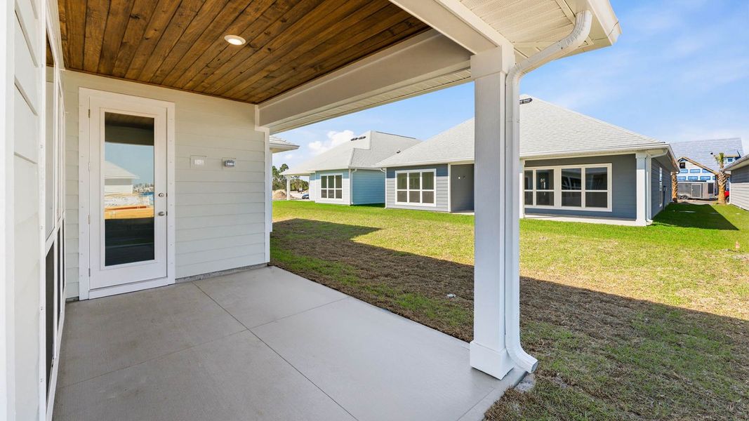 Exterior details and patio area of a home in WindMark Beach, Port Saint Joe (Image 21).