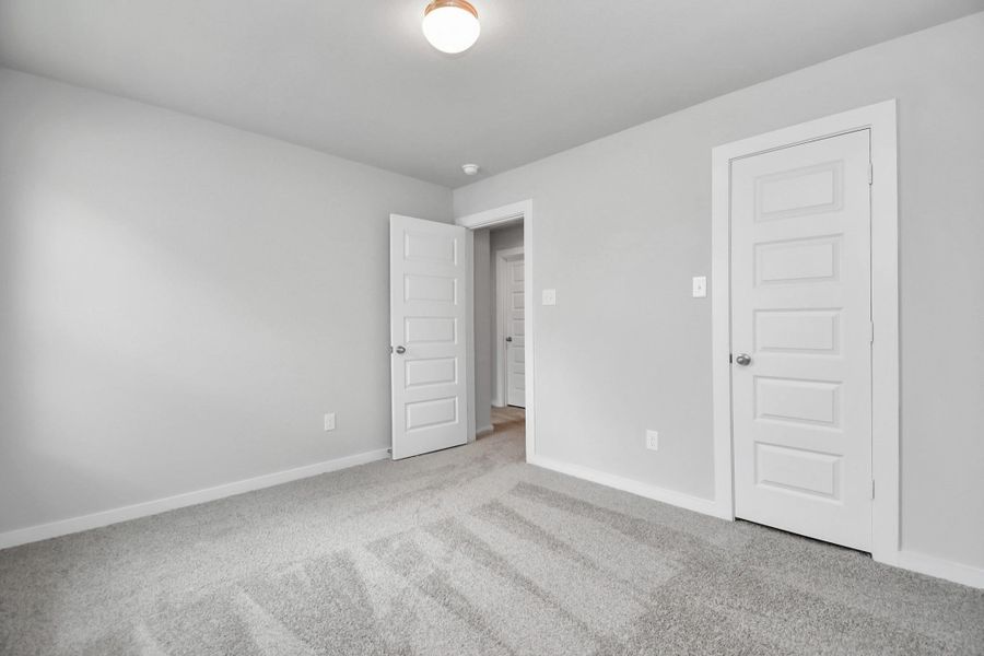 Generously sized secondary bedrooms, complete with spacious closets and soft, inviting carpeting. Generously sized secondary bedrooms, complete with spacious closets and soft, inviting carpeting.