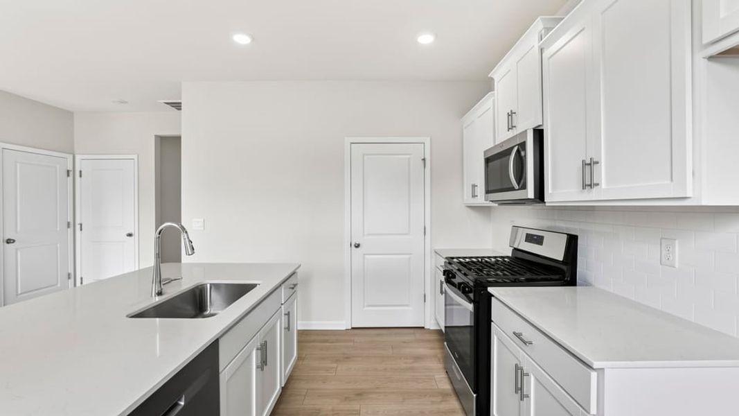 Furnished interior view inside a new home in Durbin Meadows Traditions, Fountain Inn (Image 10).