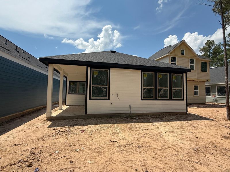 Front exterior of a new home in Kresston, Montgomery, TX, highlighting curb appeal (Image 10).