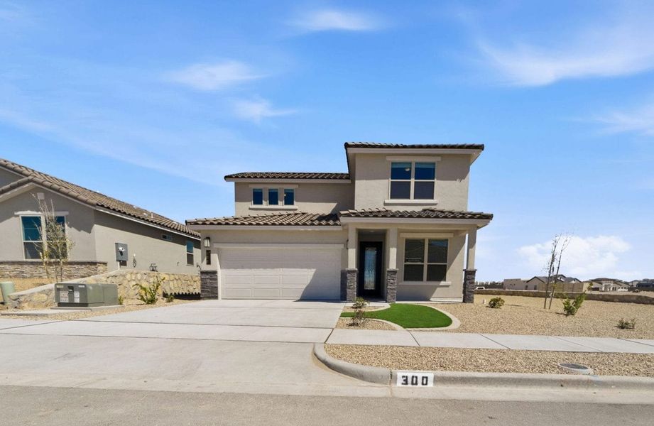 Front exterior of a new home in Emerald Estates, Horizon City, TX, highlighting curb appeal (Image 24).