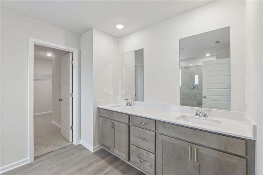 Furnished interior view inside a new home in Martin Springs - Estate Series, Lawrenceville (Image 14).