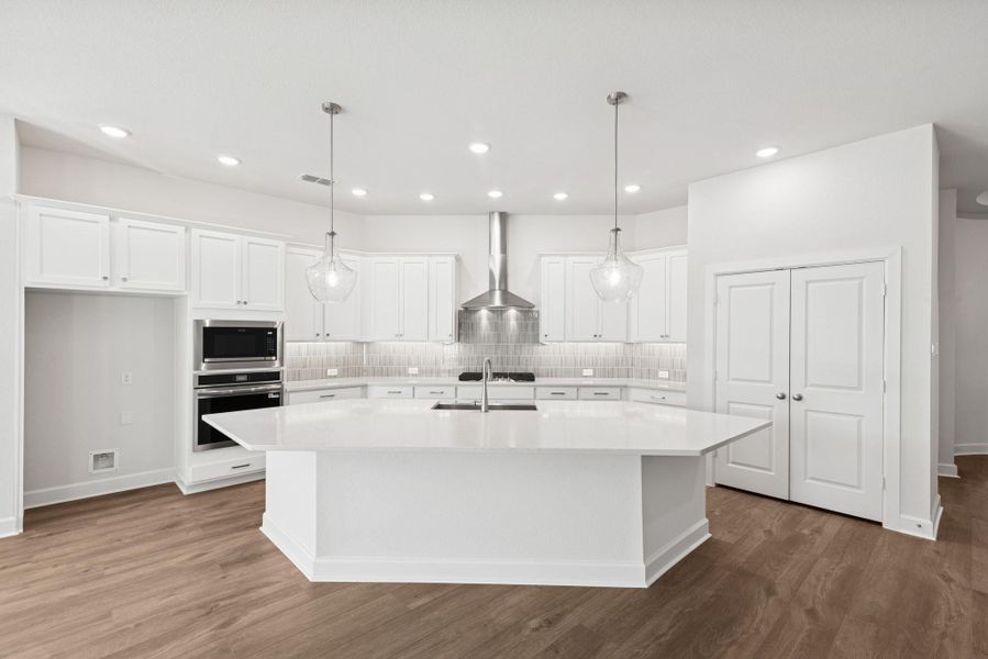 Furnished interior view inside a new home in Meridiana 55' Homesites, Manvel (Image 6).