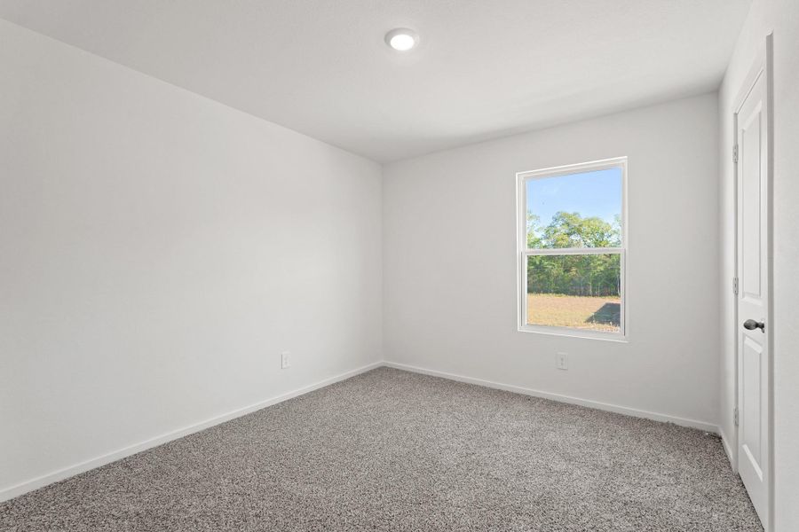Spacious, unfurnished interior of a new home in New Waverly Station, New Waverly (Image 16).