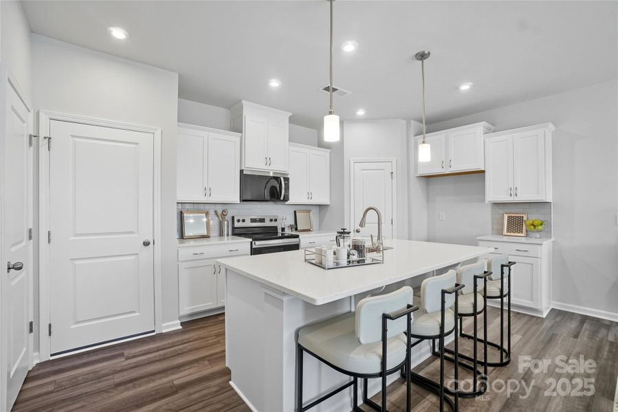 Representational only. Actual exterior elevation and interior finishes can vary.