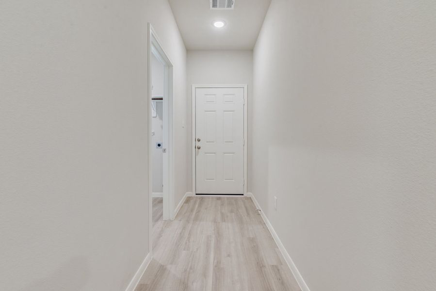 Representative unfurnished interior of a home built from the Floor Plan 1784 by Colina Homes in Tidwell Lakes, Houston (Image 22).
