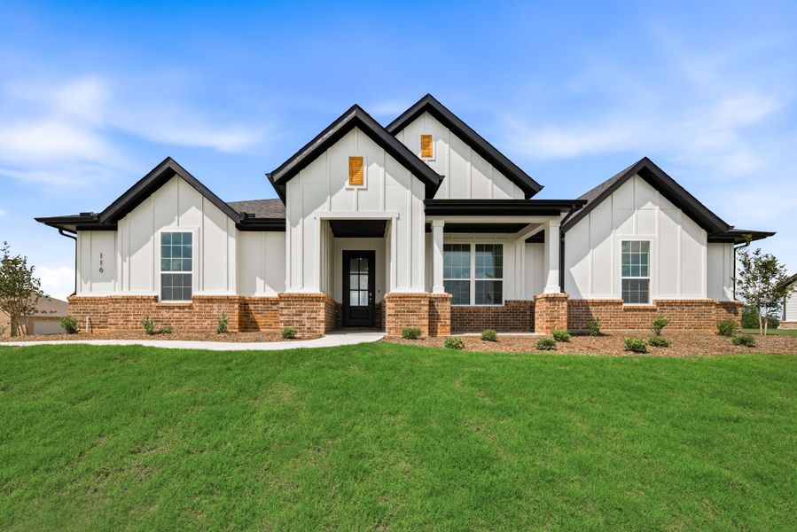 Front exterior of a new home in Saddleback Estates, Boyd, TX, highlighting curb appeal (Image 26).