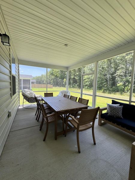 Exterior details and patio area of a home in Heron's Walk at Summers Corner: Arbor Collection, Summerville (Image 25).