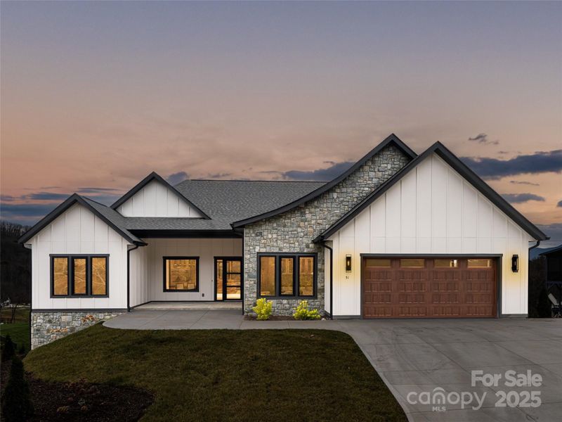 Front exterior of a new home in , Candler, NC, highlighting curb appeal (Image 28). Front exterior of a new home in , Candler, NC, highlighting curb appeal (Image 28).