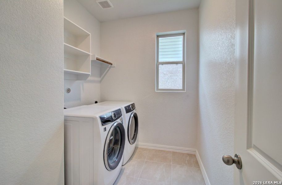 Furnished interior view inside a new home in Stream Waters, Seguin (Image 10).