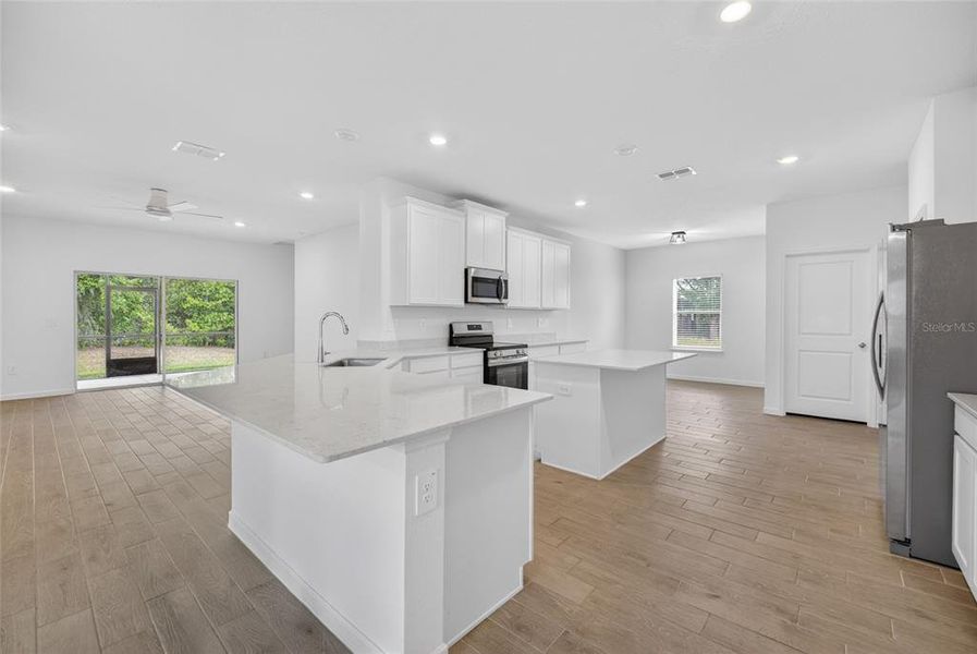 Furnished interior view inside a new home in , Dunnellon (Image 8).
