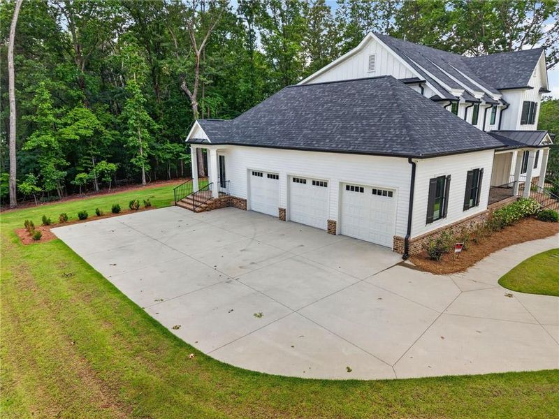 Front exterior of a new home in , Cumming, GA, highlighting curb appeal (Image 25).