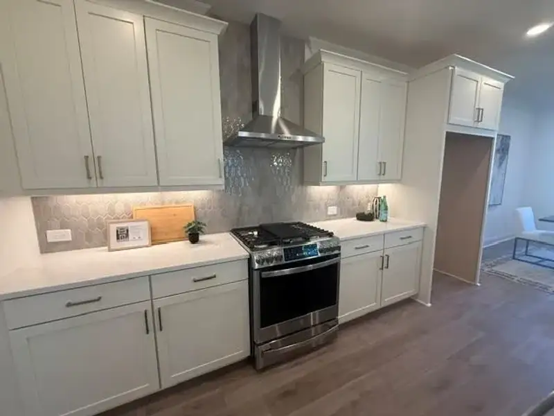 Furnished interior view inside a new home in Millcroft, Buford (Image 11).