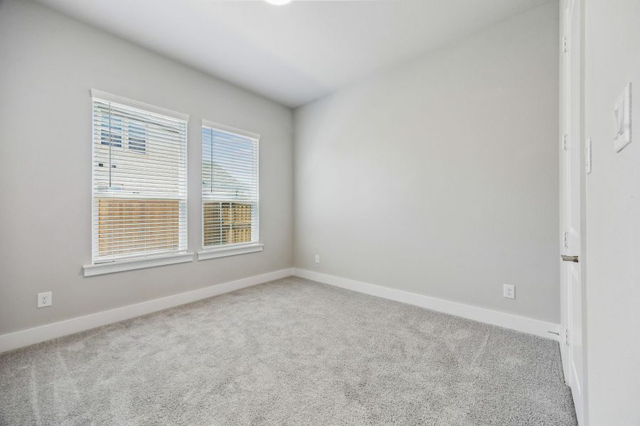 Spacious, unfurnished interior of a new home in Rainwater Crossing, Celina (Image 32).